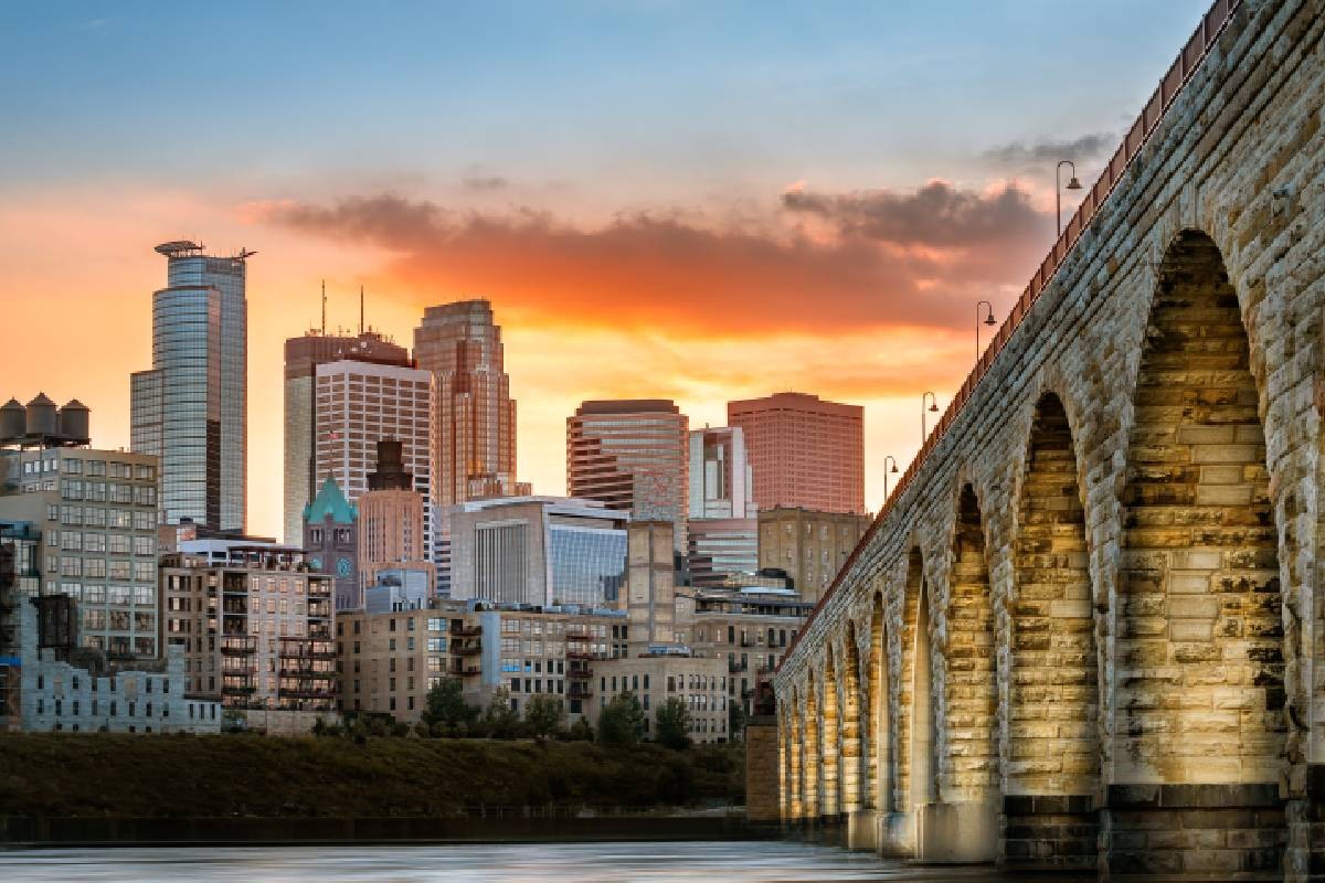 A stone arch bridge in Minneapolis, Minnesota, the neighbor to Corcoran, Minnesota (MN)